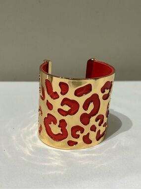 BCBG Maxazria Gold tone and Coral Leatherette Animal Print Cuff Bracelet